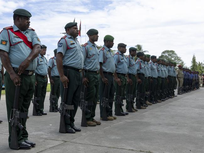 Papua New Guinea Defence Force soldiers prepare to conduct a ceremonial parade to celebrate the 49th Independence Day at King Charles Oval at Wewak, Papua New Guinea. PHOTO: LCPL Riley Blennerhassett