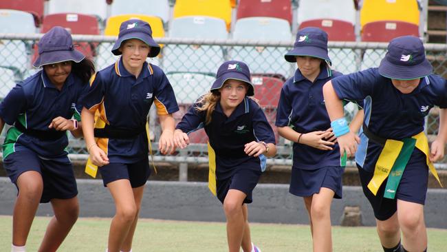 Kids from Peace Lutheran College prepare for some fun playing touch. Picture: Jake Garland
