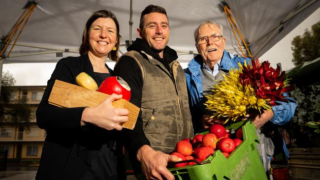 Adelaide Showground Farmers' Market stallholders Rebekah McCaul from Alexandrina Cheese Co, Joel Brockhoff from Pomology at Tarrawood and Bill Cooksley from Rich Pickings Flowers, Wayville, Kaurna Yarta. Picture: Morgan Sette