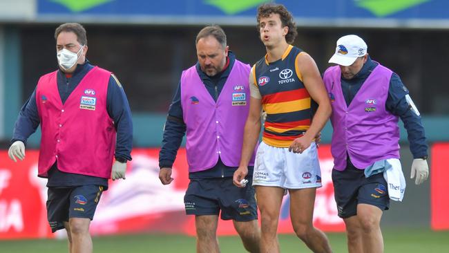 HOBART, AUSTRALIA – JUNE 26: Will Hamill of the Crows leaves the field with concussion in 2022. (Photo by Simon Sturzaker/AFL Photos via Getty Images)