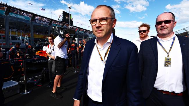 The Premier held a meeting with Formula One Group chief executive Stefano Domenicali (middle) just after this year’s Melbourne Grand Prix. Picture: Mark Thompson/Getty Images