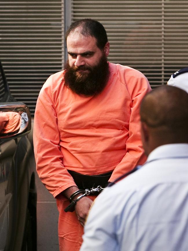 Bilal Khazal arrives in handcuffs at the NSW Supreme Court for his sentencing hearing. File picture