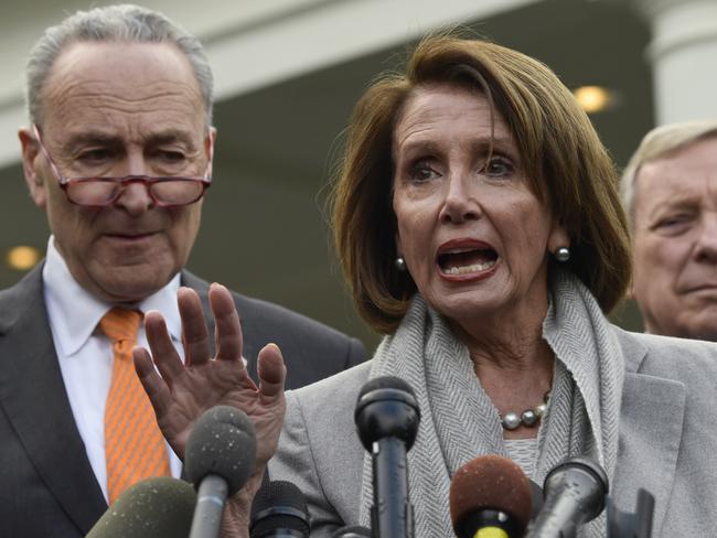 House Speaker Nancy Pelosi of Calif., center, speaks as she stands next to Senate Minority Leader Sen. Chuck Schumer of N.Y., left, and Sen. Dick Durbin, D-Ill., right, following their meeting with President Donald Trump at the White House in Washington, Wednesday, Jan. 9, 2019. (AP Photo/Susan Walsh)