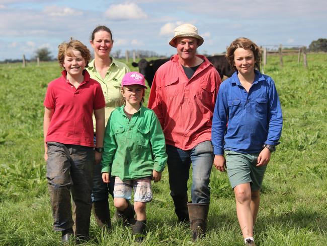 Book smart: Peter Neaves and Kate Mirams with their children, from left Tristan, 11, Daniel, 8 and Angus, 12, have taken all the worry out of balancing the books. Picture: Lyndal Reading