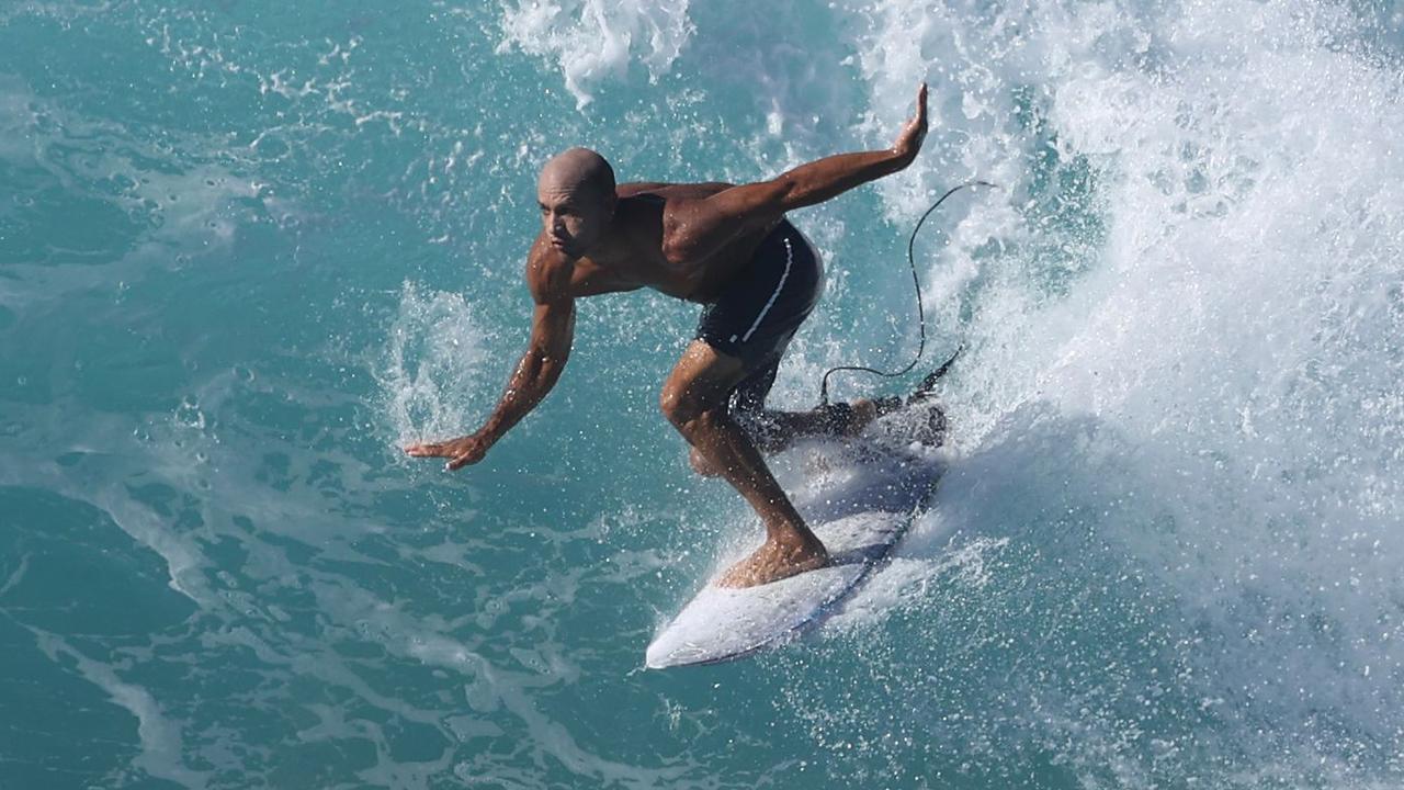 Pro surfer Kelly Slater at Banzai Pipeline in Haleiwa, Hawaii. (Photo by Gregory Shamus/Getty Images)