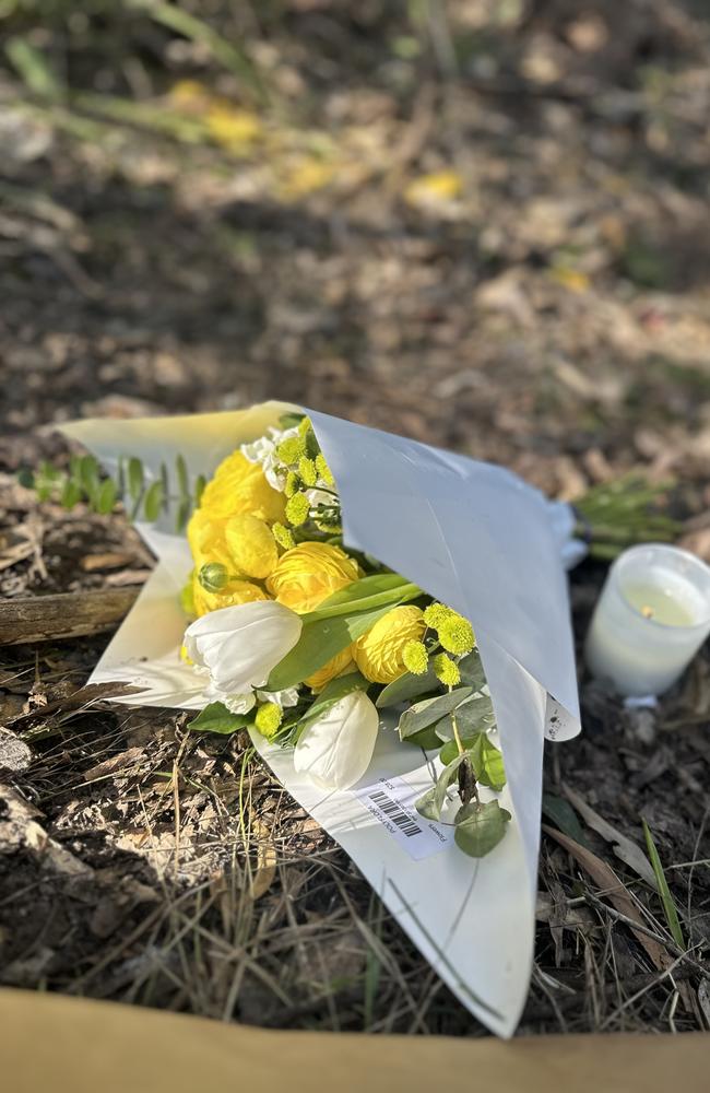 Tributes left at the scene on Bonogin Rd. Picture: Ashleigh Jansen