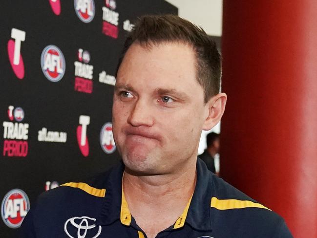 Adelaide Crows list manager Justin Reid leaves after the opening day of the AFL trade period as club representatives begin trade discussions in Melbourne, Monday, October 7, 2019. (AAP Image/Michael Dodge) NO ARCHIVING