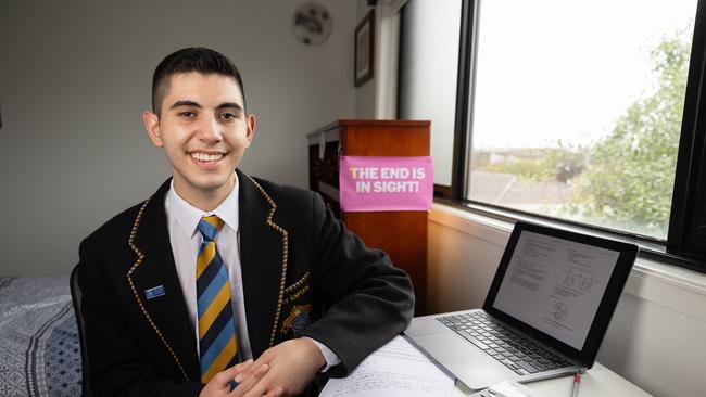 Sebastian Khoury is a Year 12 student at St Bernard's College in Victoria preparing to sit the English exam - he also survived cancer and has written a book. Picture: Jason Edwards