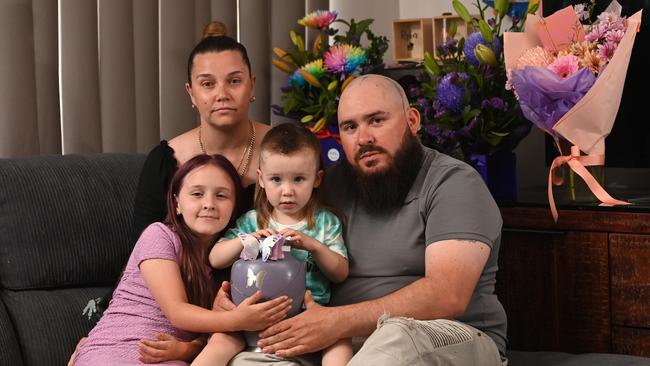 Tim Masters and partner Jessica Blades lost their eldest daughter, Maci-Louise, in January 2020 aged just six. They are pictured with her siblings Amelia, 8, and Ryker, 2. Picture: Keryn Stevens