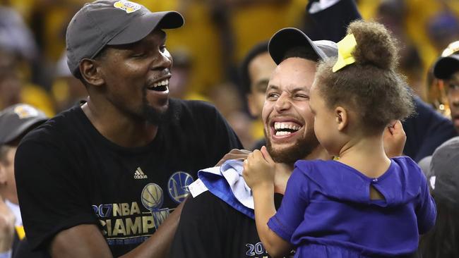 Kevin Durant and Stephen Curry after defeating the Cleveland Cavaliers in the NBA Finals.