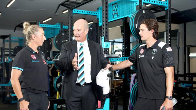 Port Adelaide chairman David Koch (centre) with Janelle Cuthbertson and Connor Rozee. Picture: Dean Martin