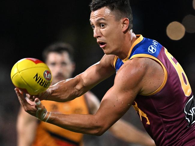 IPSWICH, AUSTRALIA - FEBRUARY 27: Hugh McCluggage of the Lions handballs during the 2025 AAMI AFL Community Series match between Brisbane Lions and Adelaide Crows at Brighton Homes Arena on February 27, 2025 in Ipswich, Australia. (Photo by Bradley Kanaris/Getty Images)