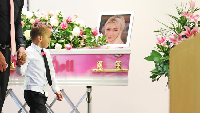 Ellie Price’s son, Mostafa, 4 walks past her coffin. Picture: Zak Simmonds