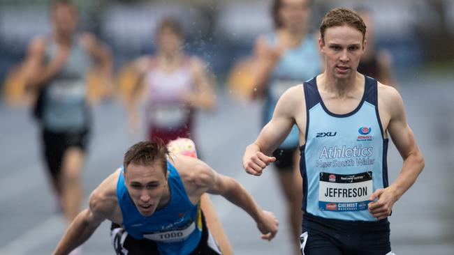 Charlie Jeffreson from Hunters Hill wins despite the lunge from Hayden Todd.