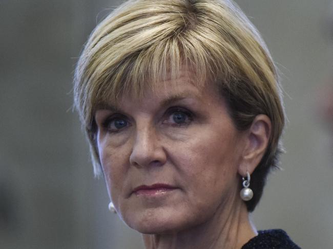 Australian Foreign Minister Julie Bishop (L) listens the speech of Chinese Foreign Minister Wang Yi at a press conference at the Ministry of Foreign Affairs in Beijing on February 17, 2016. Bishop is here on her second leg of a five-day visit to Japan and China. AFP PHOTO / FRED DUFOUR