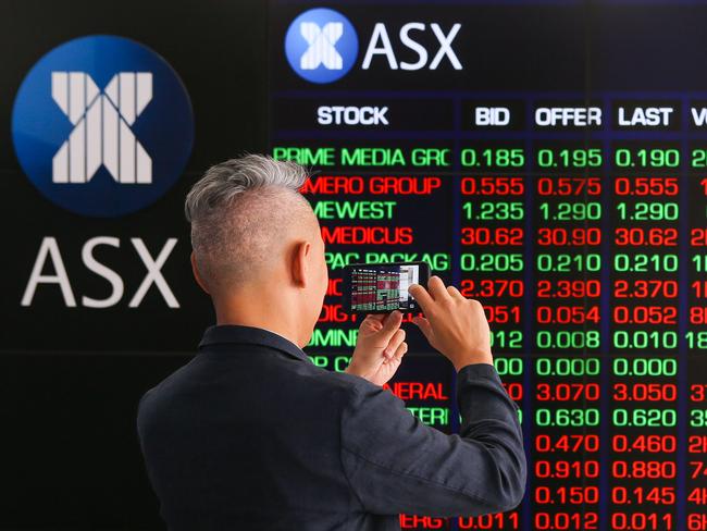 SYDNEY, AUSTRALIA - NewsWire Photos DECEMBER 09 2020: A man is seen reviewing the market at the ASX today in Sydney Australia. Picture: NCA NewsWire / Gaye Gerard