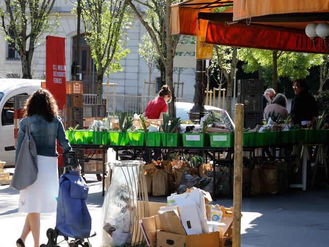 Costumers waits to buy food in Paris. Picture: AFP.