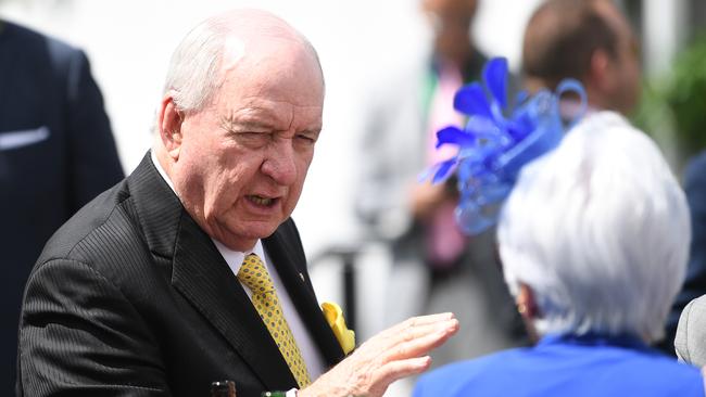 Alan Jones (left) is seen in the Lexus marquee during the Kennedy Oaks Day, as part of the Melbourne Cup Carnival, at Flemington Racecourse in Melbourne, Thursday, November 8, 2018. (AAP Image/Julian Smith) NO ARCHIVING, EDITORIAL USE ONLY