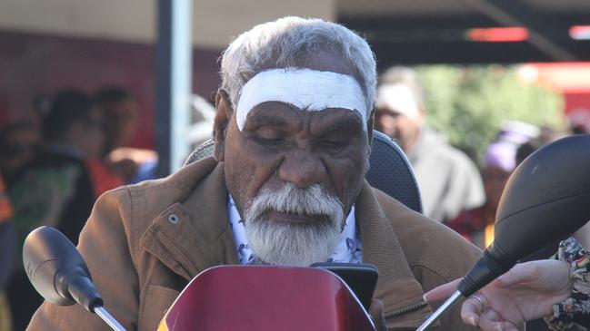 Senior Warlpiri elder Ned Hargraves at his 24-year-old grandson's vigil outside Coles in Alice Springs on Friday. The young man who died in custody on Tuesday. Picture: Gera Kazakov