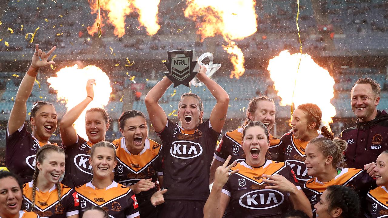 Ali Brigginshaw of the Broncos holds aloft the Premiership trophy as she celebrates with team mates after winning the NRLW Grand Final on October 25, 2020. Picture: Cameron Spencer/Getty Images