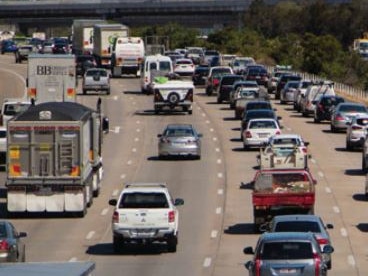 The M1 or Pacific Motorway and congestion at the Helensvale exit. This photograph is from a Coomera Connector business study.