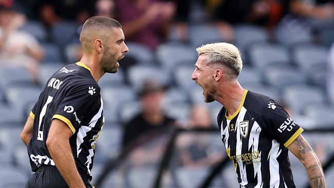 SYDNEY, AUSTRALIA - FEBRUARY 09: Martin Jakolis of the Bulls celebrates scoring a goal with team mate Tomislav Uskok during the round 18 A-League Men match between Macarthur FC and Western United at Campbelltown Stadium, on February 09, 2025, in Sydney, Australia. (Photo by Brendon Thorne/Getty Images)