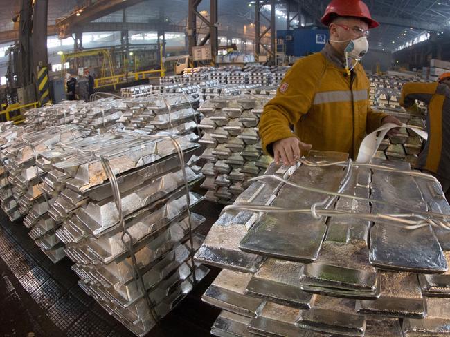 FILE: Workers mark stacks of aluminium ingots in preparation for shipping in the foundry at the Sayanogorsk aluminium smelter, operated by United Co. Rusal, in Sayanogorsk, Russia, on Thursday, Feb. 26, 2015. United Co. Rusal -- the biggest aluminum maker outside China -- and seven other Deripaska-linked firms were the most prominent targets in a list of 12 Russian companies the U.S. hit with sanctions on Friday intended to punish the country for actions in Crimea, Ukraine and Syria, and attempting to subvert Western democracies. Our editors select the best archive images on Deripaska and Rusal. Photographer: Andrey Rudakov/Bloomberg