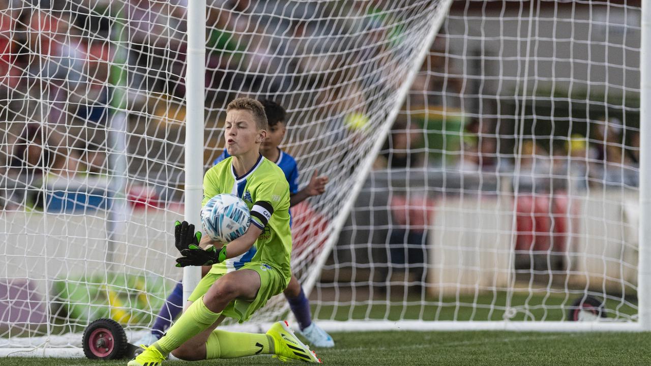 Rockville Rovers White goalkeeper Clancy Holcombe makes a save against USQ FC in Football Queensland Darling Downs Community Juniors U13 Div 1 Maroon grand final at Clive Berghofer Stadium, Friday, August 30, 2024. Picture: Kevin Farmer