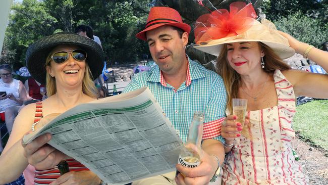 Punters flock trackside in perfect sun