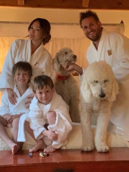 Chef Curtis Stone, wife Lindsay Price and sons and dogs in a hotel after being evacuated from their LA home last year. Source: Instagram