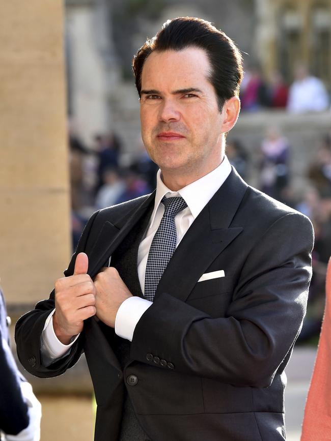 British comedian Jimmy Carr looking dapper as he heads inside the church. Picture: AP