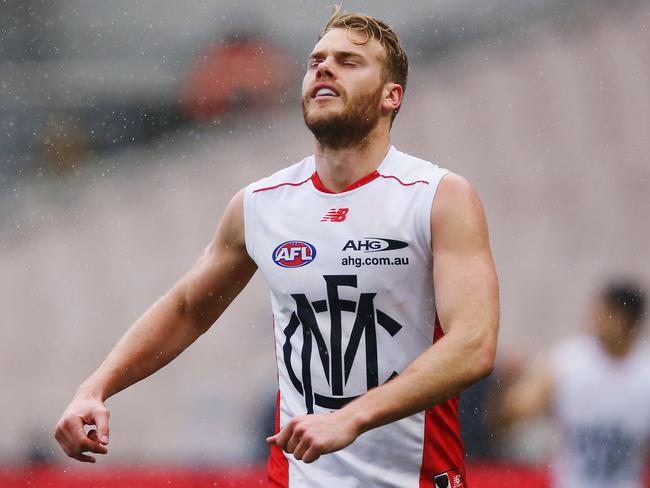 MELBOURNE, AUSTRALIA - AUGUST 21: Jack Watts of the Demons reacts after missing a kick fo goal during the round 22 AFL match between the Carlton Blues and the Melbourne Demons at Melbourne Cricket Ground on August 21, 2016 in Melbourne, Australia. (Photo by Michael Dodge/Getty Images)