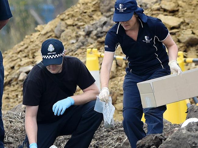 Evidence is wrapped up and taken away for forensic testing. Human remains located during search of a property in Thomastown as part of the investigation into the disappearance of Terrance Blewitt back in 2004. Picture: Nicole Garmston
