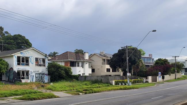 A house two doors down from the derelict house is advertised for sale with prestige real estate agency Kay &amp; Burton. Picture: Shaun Campbell