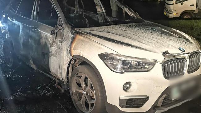 A torched BMW used in the kidnapping. Picture: NSW Police.