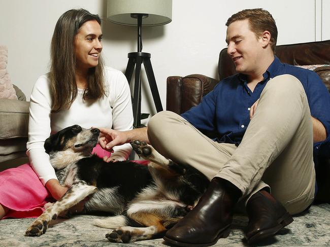 FOR AT HOME LIFTOUT. El Leverington and Freddie Evans with their dog Gemma in their Apartment. Picture: John Appleyard