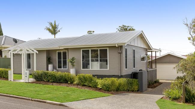 15 McNamara Street in Centenary Heights sold for $635,000 at auction through Ray White after 10 people bid on it. The sale set a new street record.