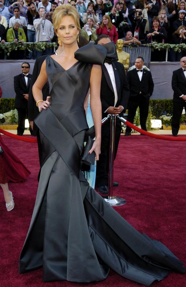 Looking like she stepped right off the set of Dynasty, Charlize Theron was nominated for an Oscar for best actress in a leading role for her work in ‘North Country’, but won the award for most over-the-top gown at the 2005 Oscars. Picture: Getty