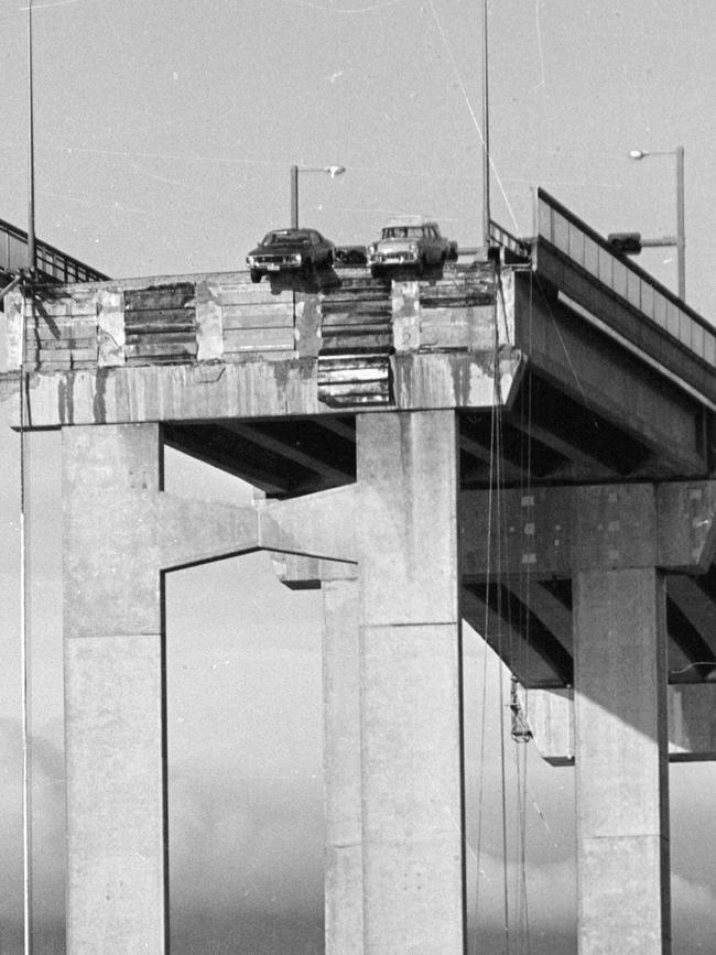 Historical Tasman Bridge Disaster 5th January 1975, the collapsed bridge as seen from the Eastern Shore with two cars hanging on the edge, Negative Number N4753/20