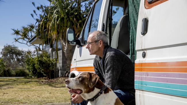 Graeme Aitken lives with his dog Duke in a van at Burleigh Beach. Picture: Jerad Williams