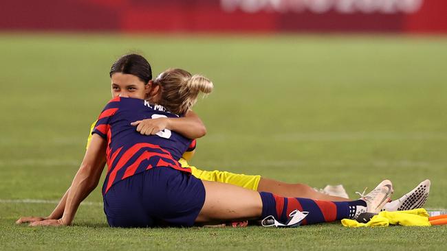 A power couple of women’s football share a little hug. (Photo by Francois Nel/Getty Images)