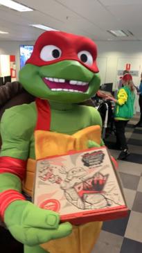 The turtles bring the Mutant Mayhem to the news.com.au office!