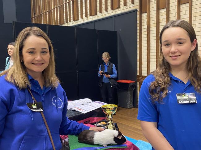 Katrina and Emily, of Western Australia, at the Australian National Cavy Show with Sugar.