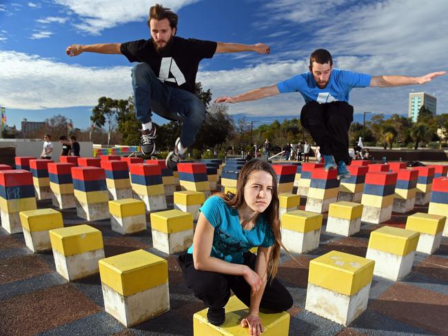 SA Parkour Association members Tony Ojay, Stephanie Bye and president Travis Ranson are upset the Hajek Plaza sculptures are going. Pic: Tom Huntley