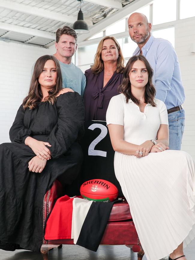 Robert Harvey, Anita Frawley, Stewart Loewe and Anita's daughters in front, Chelsea (left) and Danielle (right) - with Danny Frawley's famous No.2 St Kilda guernsey to announce Spud’s Game. Picture: Corey Scicluna