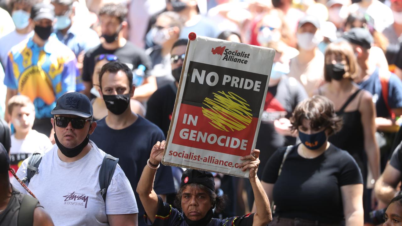 Protesters march down Elizabeth St in Sydney. Picture: John Grainger