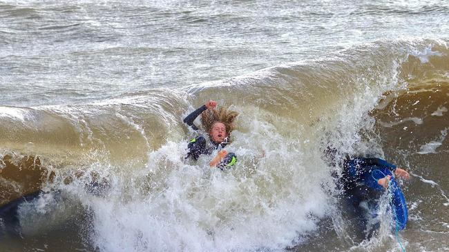 Surfers possibly not enjoying the swell at Brighton Jetty today. Picture: Rick Beal