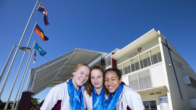 St Peters Springfield trio Ella Ramsay, Mollie O'Callaghan and Claveria Johnson are thriving under the environment at the St Peters Western Swim Club. (AAP Image/Renae Droop)