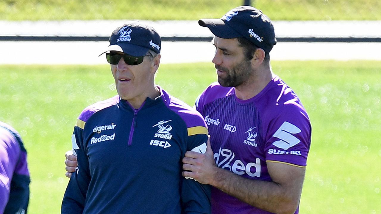 Cameron Smith chats with Melbourne coach Craig Bellamy.