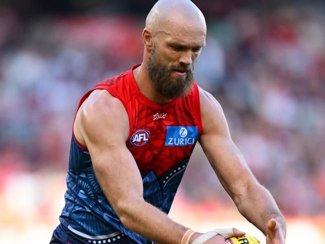 MELBOURNE, AUSTRALIA - MAY 25: Max Gawn of the Demons kicks for goalduring the round 11 AFL match between Narrm (Melbourne Demons) and Sydney Swans at Melbourne Cricket Ground, on May 25, 2025, in Melbourne, Australia. (Photo by Quinn Rooney/Getty Images)